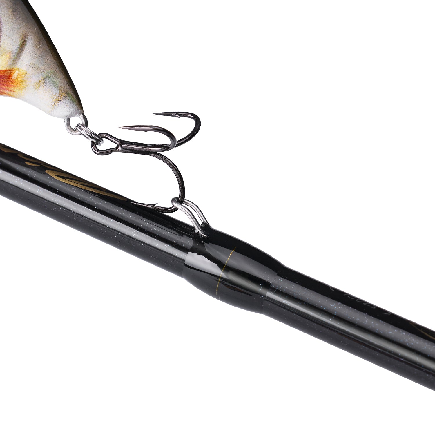 Lure attached to hook keeper on fishing rod